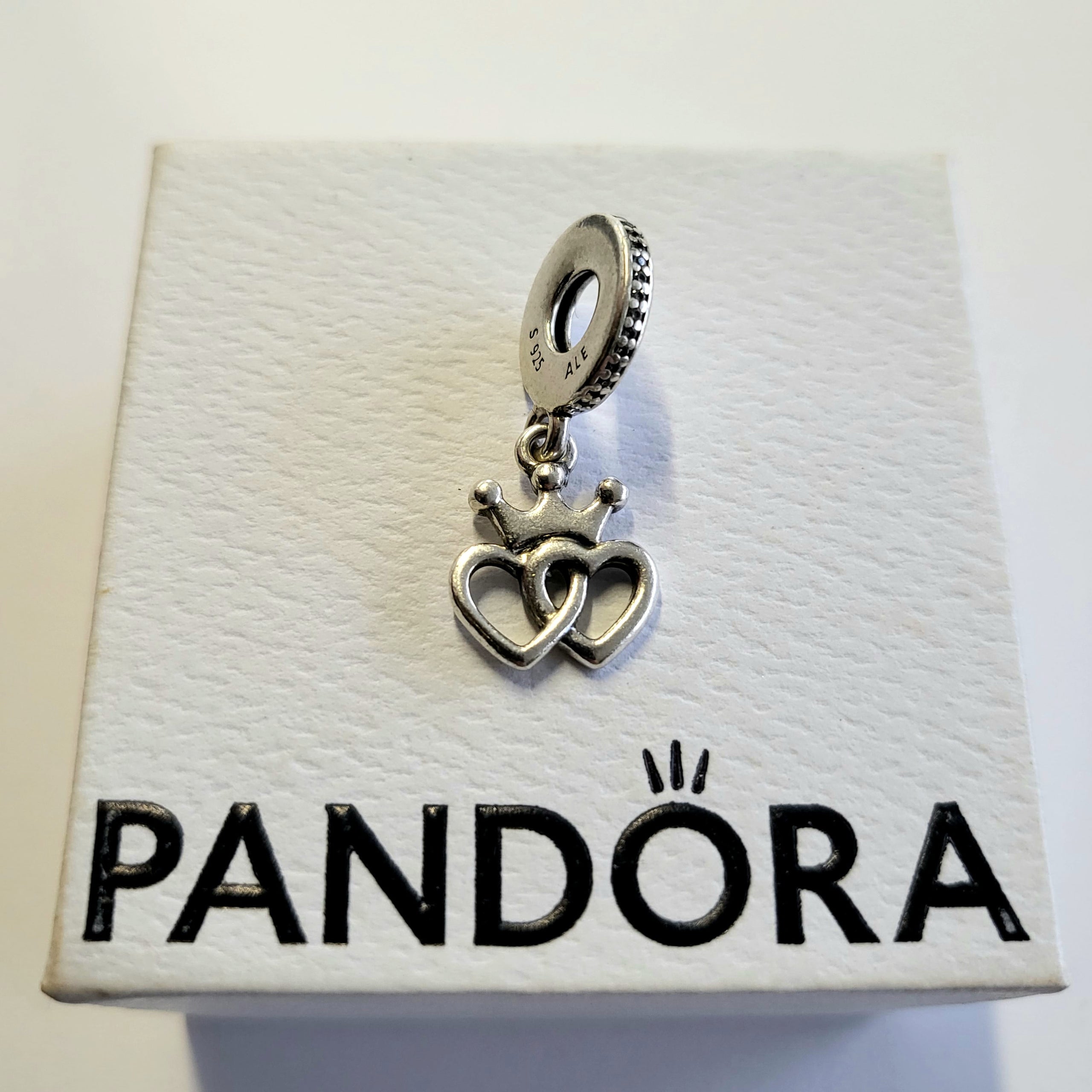 Pandora crowned sale hearts charm